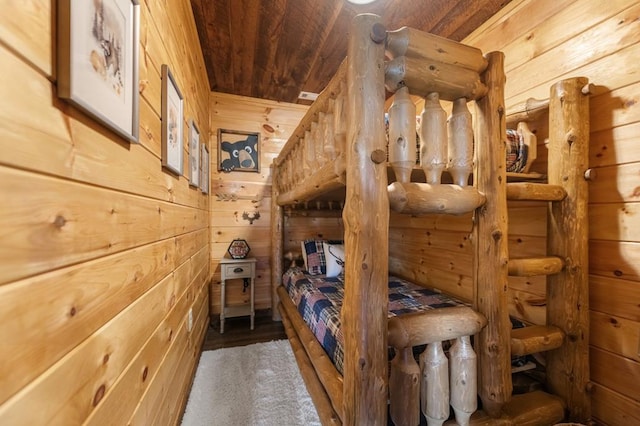 9 Quail Holw, Blue Ridge, GA 30513 - bedroom featuring wooden ceiling and wood walls