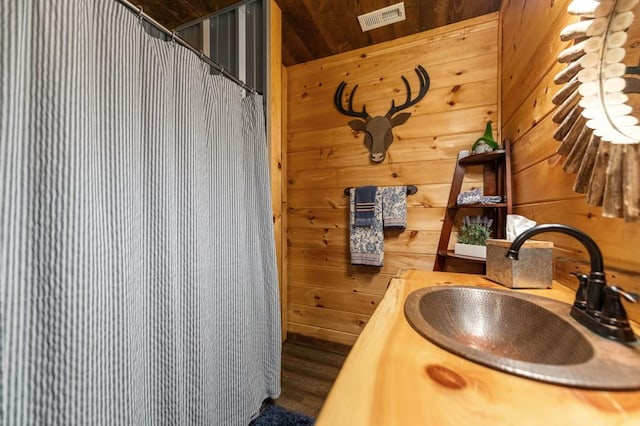 9 Quail Holw, Blue Ridge, GA 30513 - bathroom with wood walls, vanity, wood finished floors, and wooden ceiling