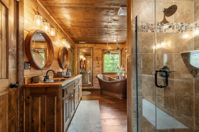 9 Quail Holw, Blue Ridge, GA 30513 - full bathroom featuring wood ceiling, wood-type flooring, double vanity, a shower stall, and wooden walls