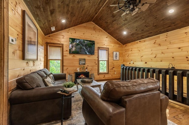 9 Quail Holw, Blue Ridge, GA 30513 - living area featuring wooden ceiling, vaulted ceiling, ceiling fan, wooden walls, and healthy amount of natural light