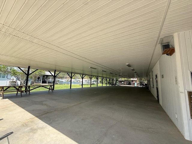 exterior space with a carport