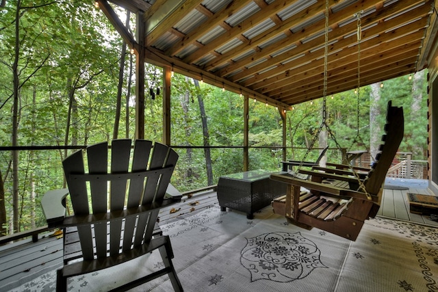 view of patio featuring a forest view