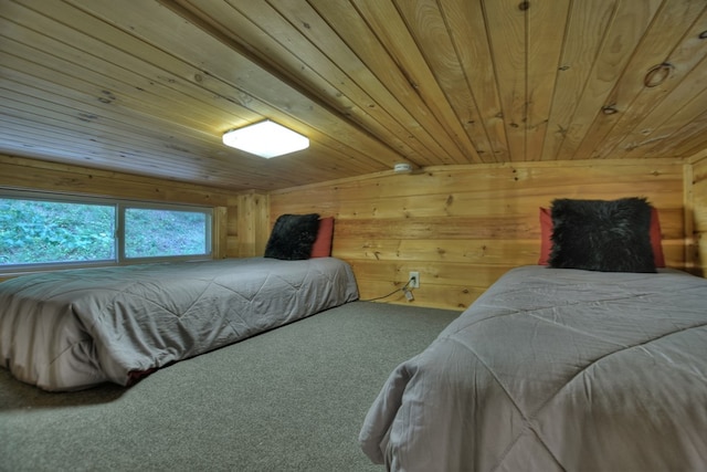 bedroom featuring carpet floors, wooden walls, and wood ceiling