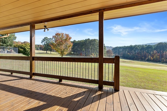 deck featuring a lawn