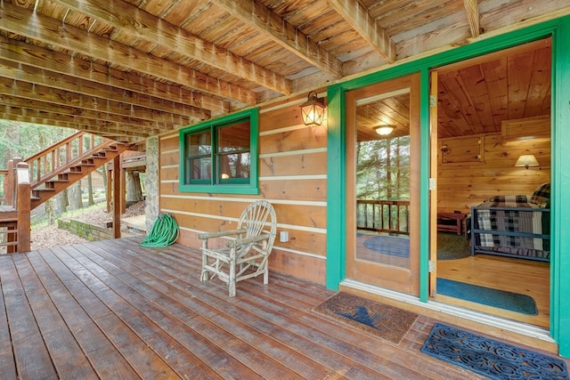 wooden terrace featuring stairway