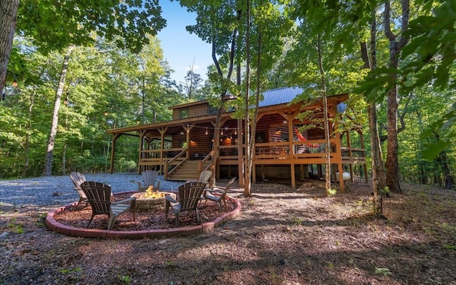 150 Laurel Trce, Blue Ridge, GA 30513 - back of house with a fire pit, metal roof, and log siding