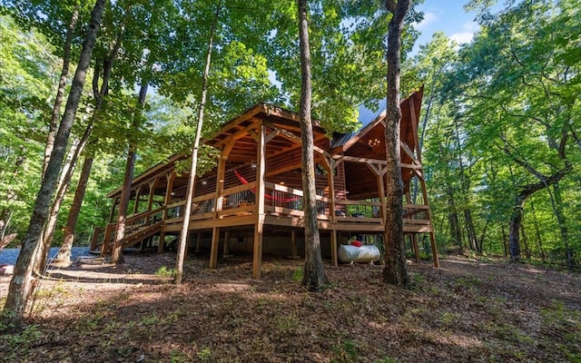 150 Laurel Trce, Blue Ridge, GA 30513 - rear view of property with stairway, a wooden deck, and metal roof
