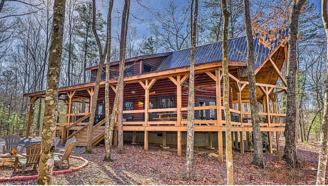 150 Laurel Trce, Blue Ridge, GA 30513 - back of property featuring metal roof, log siding, stairs, and a deck