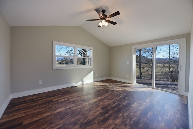 16 Sims Rd, Hiawassee, GA 30546 - spare room featuring vaulted ceiling, dark wood finished floors, and baseboards