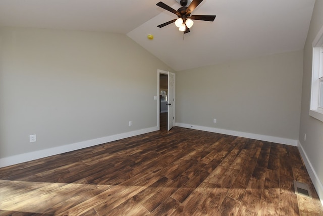 16 Sims Rd, Hiawassee, GA 30546 - empty room featuring dark wood-style floors, visible vents, vaulted ceiling, ceiling fan, and baseboards