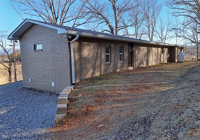 16 Sims Rd, Hiawassee, GA 30546 - view of side of property with brick siding