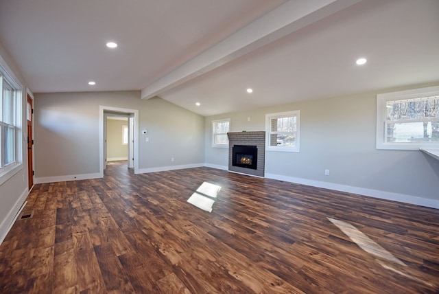 16 Sims Rd, Hiawassee, GA 30546 - unfurnished living room featuring dark wood-style floors, a fireplace, visible vents, lofted ceiling with beams, and baseboards
