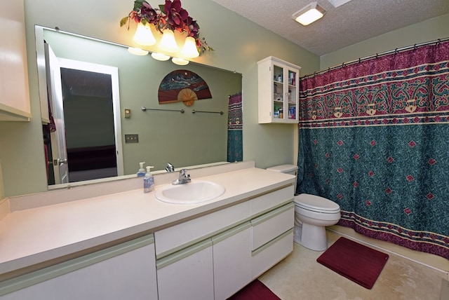 bathroom with toilet, a textured ceiling, a shower with shower curtain, and vanity