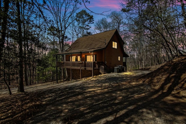 view of property exterior at dusk