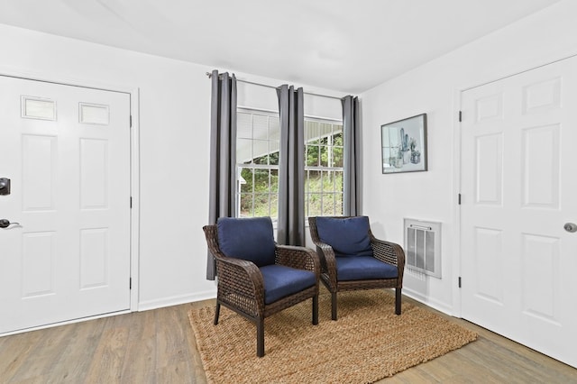 sitting room featuring hardwood / wood-style floors