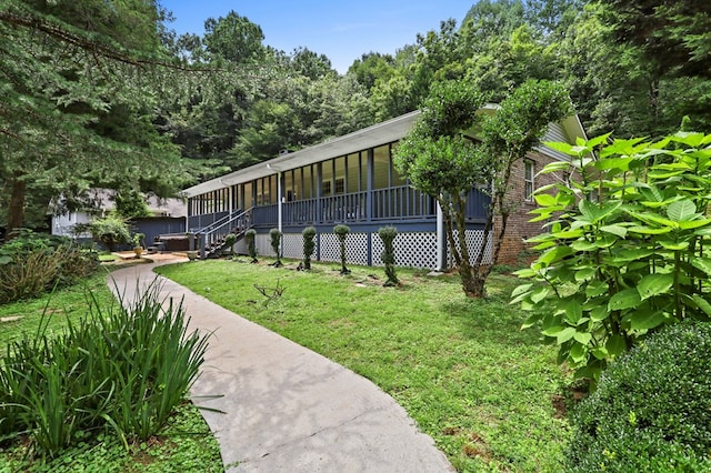 view of home's exterior with a porch and a yard