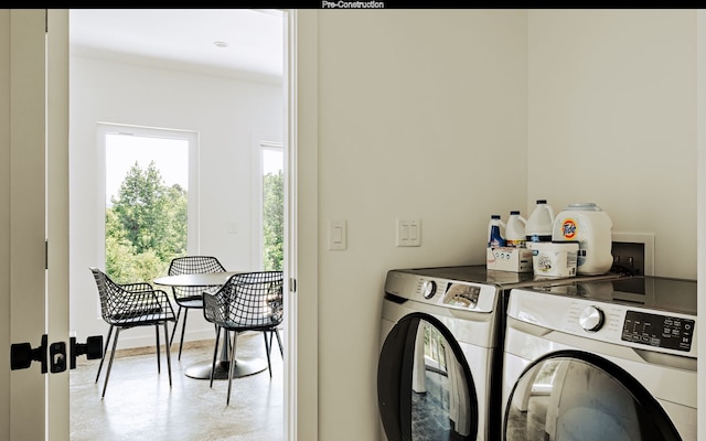 laundry room with washing machine and clothes dryer and washer hookup