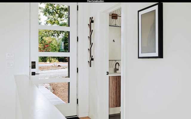 doorway to outside featuring plenty of natural light