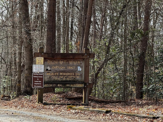 exterior details with a forest view