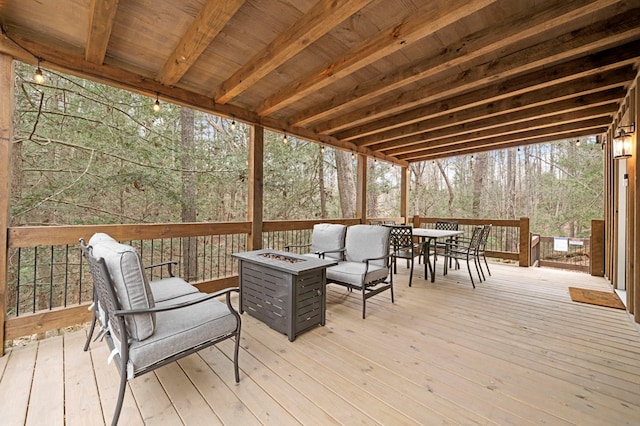 deck featuring a fire pit