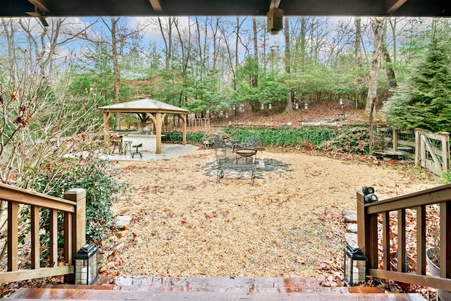 view of yard featuring a gazebo and a patio area