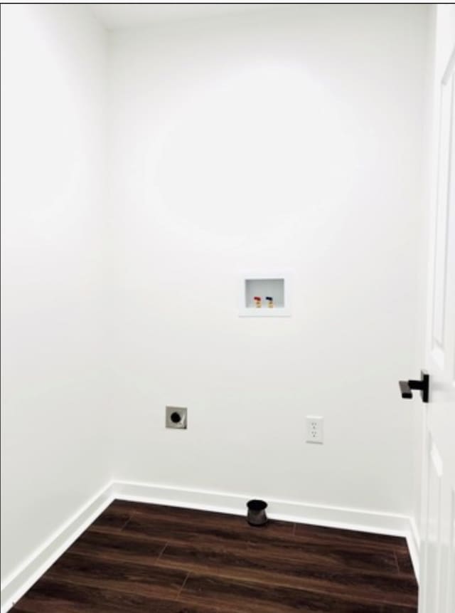 laundry room with washer hookup, laundry area, baseboards, and dark wood-style flooring