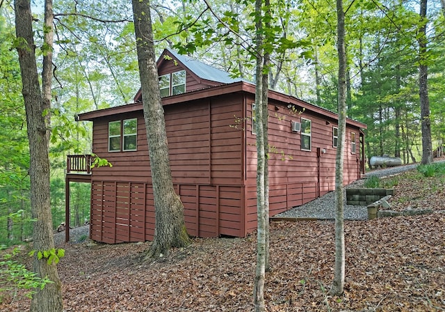 view of side of property with a deck