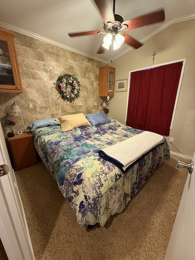 bedroom featuring carpet, lofted ceiling, ceiling fan, and ornamental molding