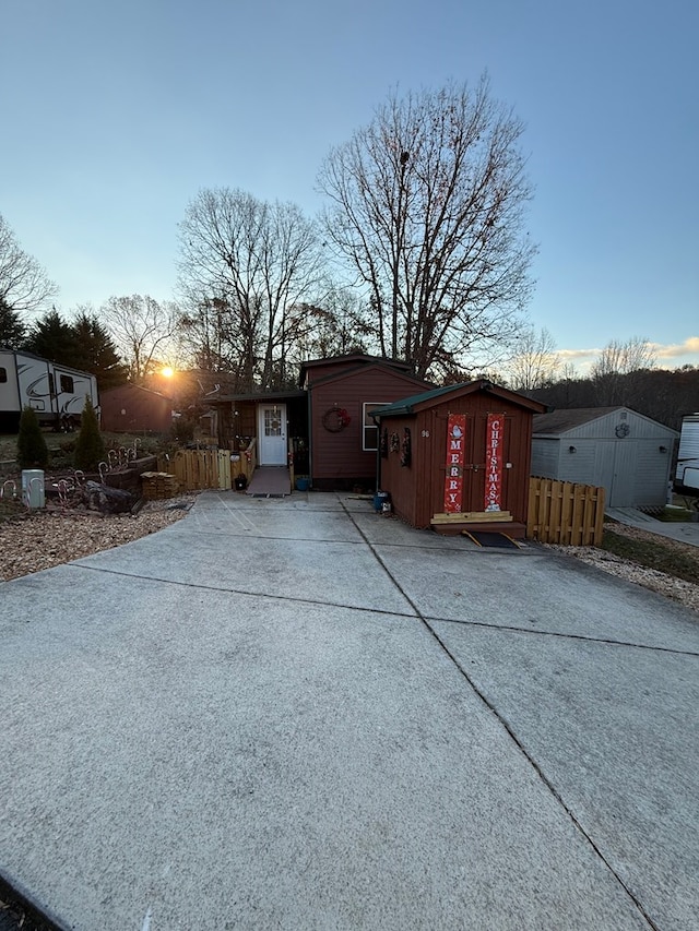 view of property exterior at dusk