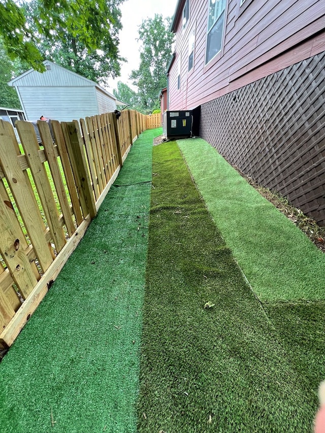 view of yard featuring cooling unit