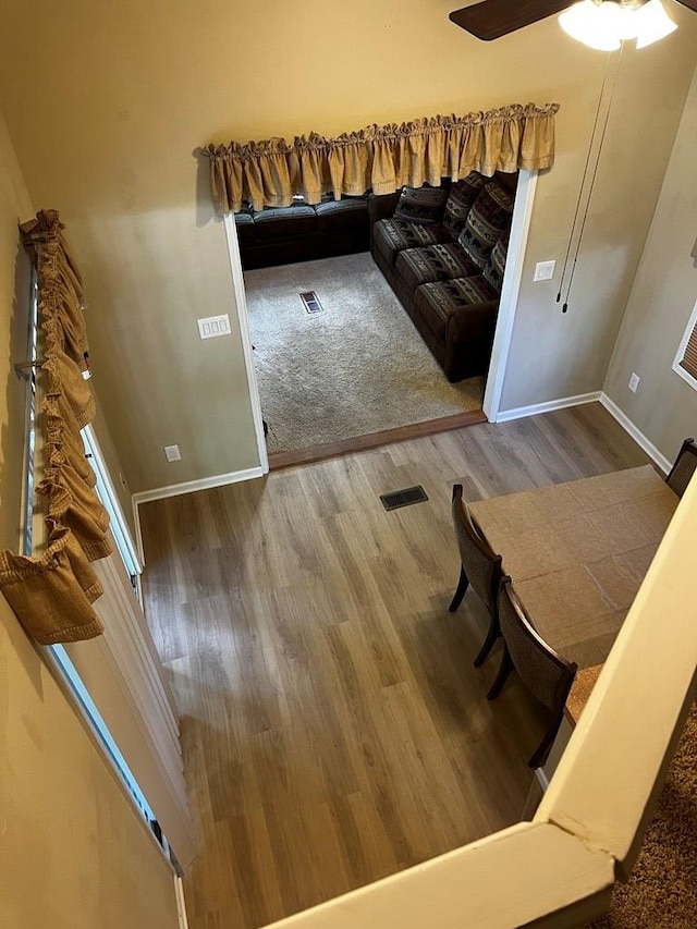 96 Stag Leap Dr, Cleveland, GA 30528 - living area with wood finished floors, a ceiling fan, and baseboards