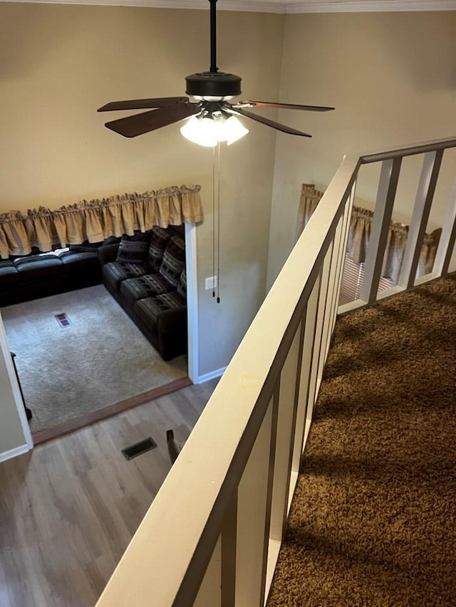 96 Stag Leap Dr, Cleveland, GA 30528 - stairway with ceiling fan, wood finished floors, and crown molding