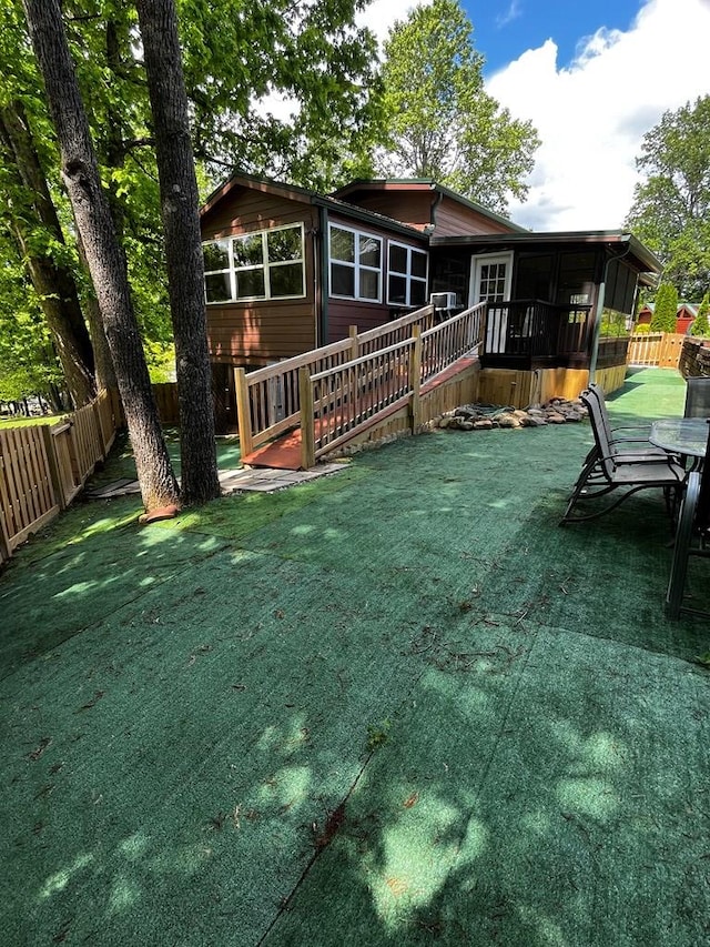 96 Stag Leap Dr, Cleveland, GA 30528 - rear view of house with a sunroom
