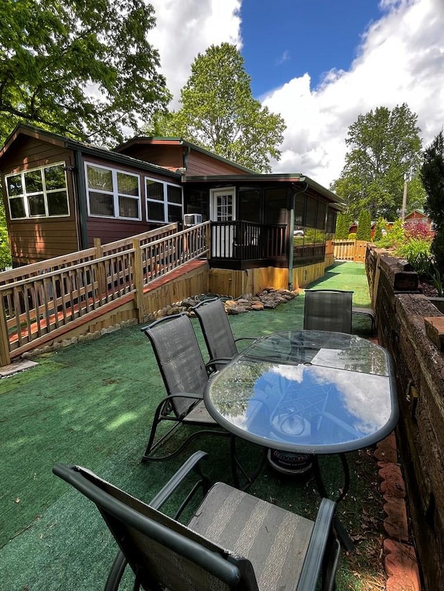 96 Stag Leap Dr, Cleveland, GA 30528 - view of patio with a sunroom, outdoor dining space, and a wooden deck
