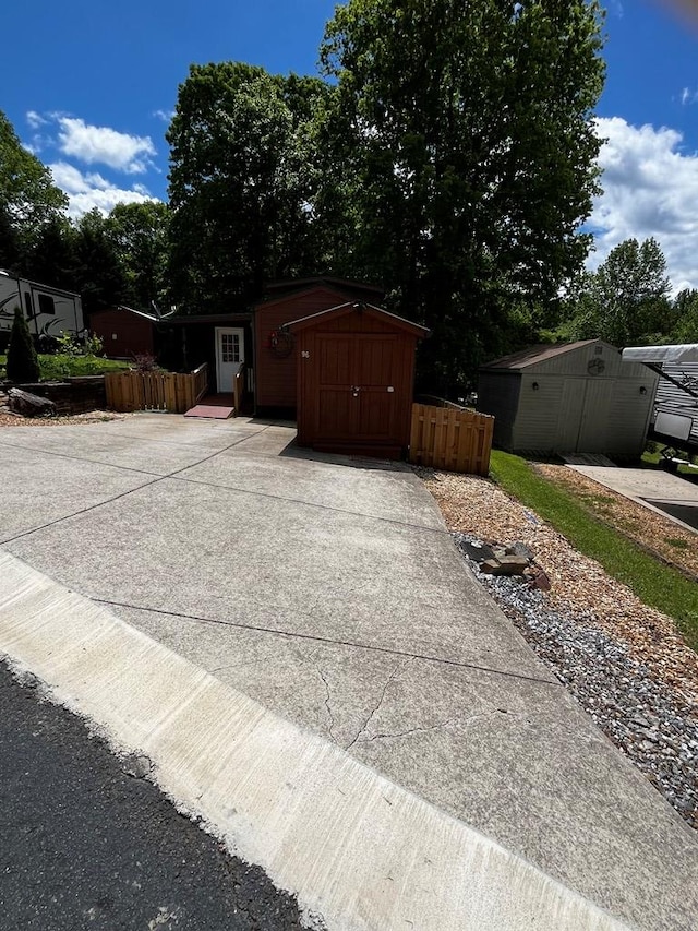 96 Stag Leap Dr, Cleveland, GA 30528 - view of property exterior featuring fence and an outdoor structure