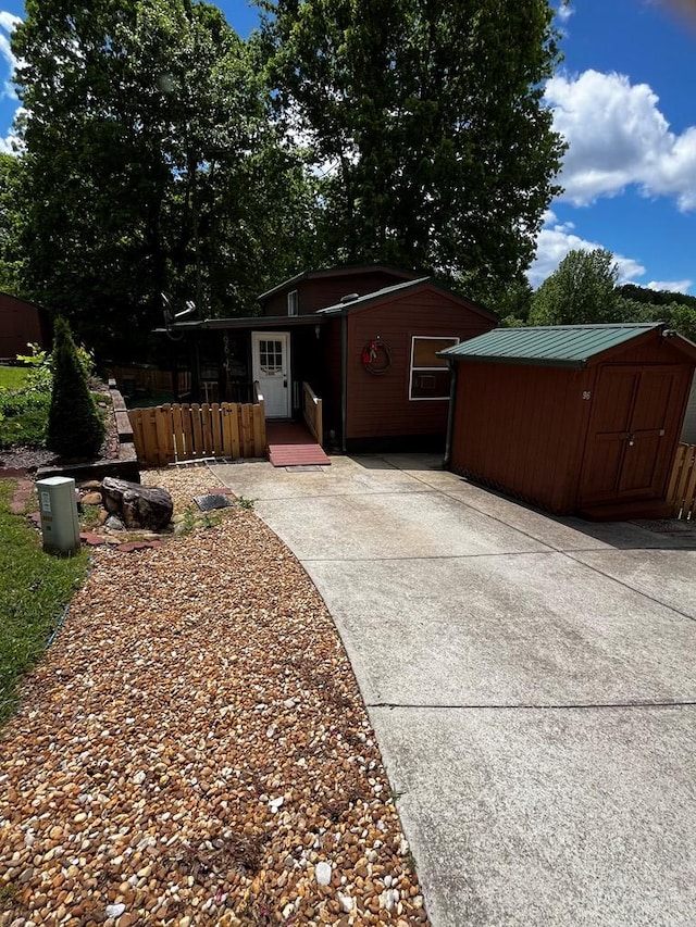96 Stag Leap Dr, Cleveland, GA 30528 - view of side of property featuring a shed and an outbuilding