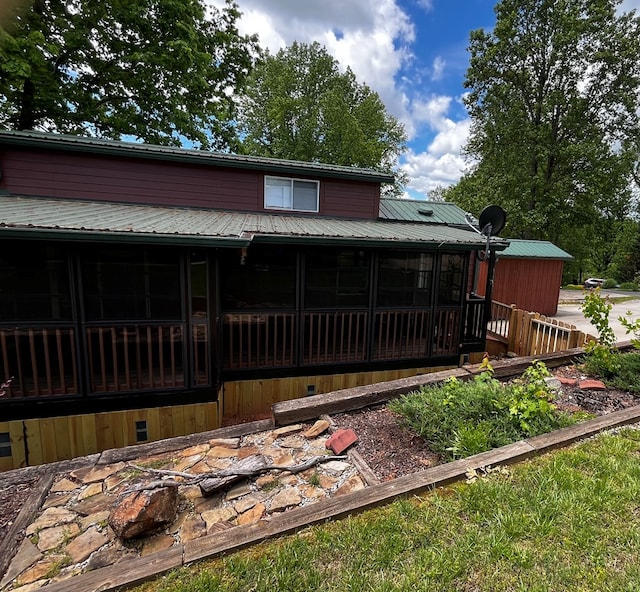 96 Stag Leap Dr, Cleveland, GA 30528 - back of house with a sunroom, metal roof, and crawl space
