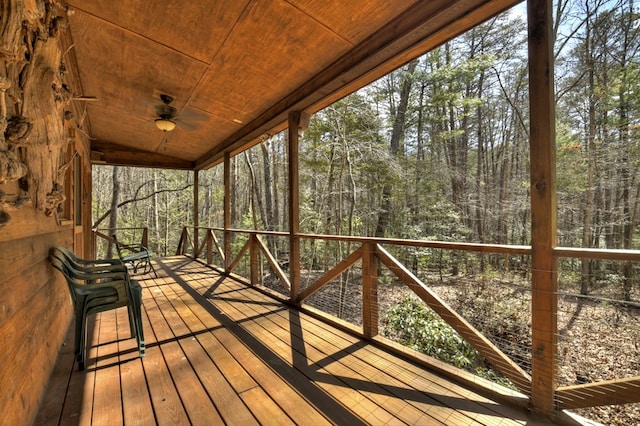 deck featuring a forest view