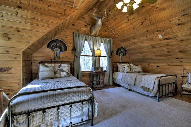 carpeted bedroom with wood walls, wooden ceiling, and lofted ceiling