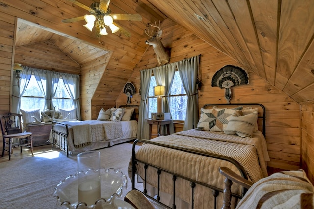 bedroom featuring multiple windows, lofted ceiling, wood walls, and wooden ceiling