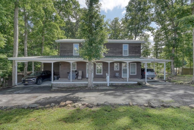 432 Jewell Mason, Blairsville, GA 30512 - farmhouse inspired home with asphalt driveway, a carport, a porch, and a metal roof