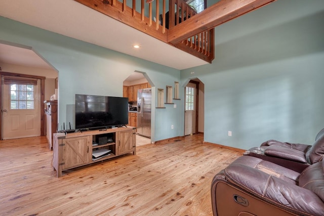 432 Jewell Mason, Blairsville, GA 30512 - living area with arched walkways, light wood finished floors, and recessed lighting