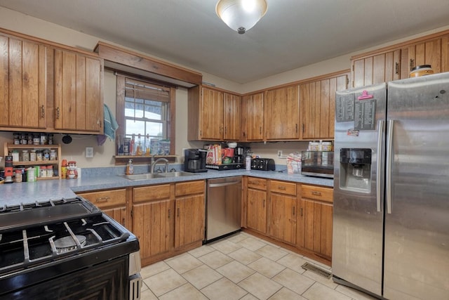 432 Jewell Mason, Blairsville, GA 30512 - kitchen featuring stainless steel appliances, brown cabinets, and light countertops