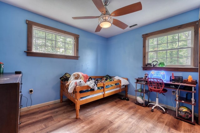 432 Jewell Mason, Blairsville, GA 30512 - bedroom with wood finished floors and ceiling fan