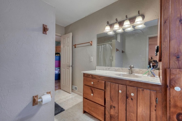 432 Jewell Mason, Blairsville, GA 30512 - full bathroom with a textured wall, vanity, tile patterned floors, and curtained shower