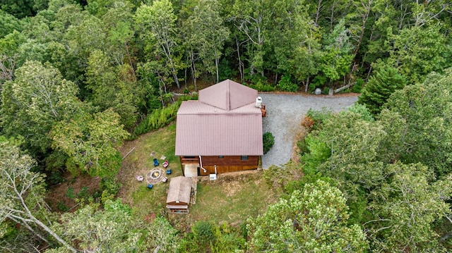 aerial view with a wooded view