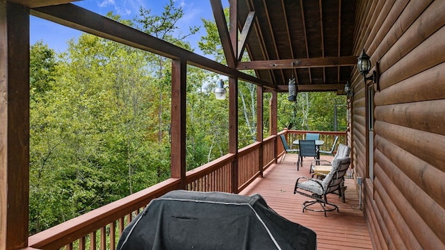 wooden deck with grilling area