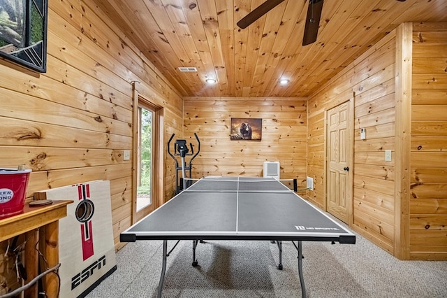 game room featuring carpet floors, wood ceiling, wooden walls, and recessed lighting