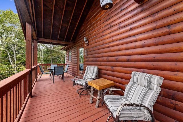 deck with outdoor dining space