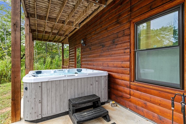 view of patio / terrace featuring a hot tub